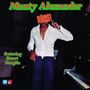 "Monty Alexander", "Rass!", "featuring Ernest Ranglin". Ein Mann mit offenem Hemd hält ein Schild vor seinem Gesicht, in der Nähe eines Klaviers., LP
