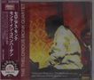 "The Thelonious Monk Quartet" steht vertikal. Ein Mann spielt Piano. Jazz-Aufnahme mit warmer, rötlich-orange Beleuchtung., CD
