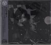 Text: "Different When It's Silent", "Tricky", japanische Schriftzeichen. 
Ein schwarz-weißes Portrait, fragmentiert und verfremdet., CD
