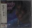 Text: „Dorothy Moore“, „¥2,300“. Eine lächelnde Person in Nahaufnahme. Oben links ein Logo mit „Malaco“., CD