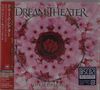 "DREAM THEATER", "LIVE IN TOKYO, 2010". Rosa Blüten mit einem zentralen, roten Siegel. Japanische Schriftzeichen links., CD