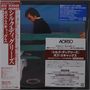 "Boz Scaggs - Silk Degrees" in Englisch und Japanisch. Links ein vertikaler roter Balken. Mann im Anzug an einem Tisch., Super Audio CD
