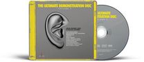 "THE ULTIMATE DEMONSTRATION DISC VOLUME 2" in Gelb. Ohrabbildung, grauer Hintergrund, CD-Hülle und Disc sichtbar.