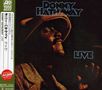 DONNY HATHAWAY LIVE. Dunkle Bühne, beleuchtetes Gesicht mit Hut. Japanische und englische Schrift links.
