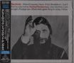 Texte: "Electronic", "Twisted Tenderness". Schwarz-Weiß-Foto eines Mannes mit erhobenem Arm. Japanische Schrift links.