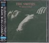 Eine CD-Hülle mit den Texten "THE SMITHS" und "The Queen Is Dead". Japanische Schrift an der linken Seite. Skizzenhaftes Bild einer liegenden Figur., CD