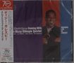 „Electrifying Evening With the Dizzy Gillespie Quintet“, lila Hintergrund, rot eingekleideter Musiker mit Trompete., CD