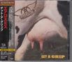 Japanische Texte links, "GET A GRIP" unten rechts. Eine Kuh mit einem Ring im Euter, darüber ein Logo., CD