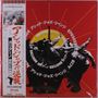 Text: "Acid Jazz Revenge", "Galliano". Schwarze Silhouetten von Menschen in Bewegung, roter Hintergrund mit gelben Strahlen., LP