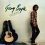 „Gary Boyle Light Again The Recordings 1977-1978“. Mann in kariertem Hemd neben Gitarre in Hülle., 2 CDs