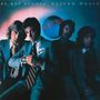 "BE BOP DELUXE - MODERN MUSIC" steht oben, vier Männer in Anzügen, einer hält ein futuristisches Gerät. Retro-Stil., LP