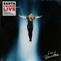 Text: "Santa L'album Live", "Live à Bruxelles". Person in schwarzem Outfit schwebt mit ausgebreiteten Armen im Lichtstrahl., 2 LPs