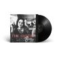 Text: "THE SMITHS BEST..." Schwarze Vinyl-Schallplatte neben einem schwarz-weißen Coverfoto einer Frau in einem Café.