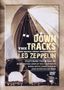 Texte auf beigem Hintergrund: "DOWN THE TRACKS, THE MUSIC THAT INFLUENCED LED ZEPPELIN, FEATURING..." Darunter Luftschiff und Brücke., DVD