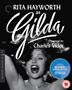 "RITA HAYWORTH as Gilda, Directed by Charles Vidor." Schwarz-Weiß-Foto einer Frau mit offenem Mund und erhobenem Arm., Blu-ray Disc