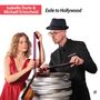 "Isabelle Durin & Michaël Ertzscheid: Exile to Hollywood." Eine Frau in Rot und ein Mann in Schwarz mit Filmrollen., CD