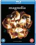 "magnolia," "written and directed by p.t.anderson." Verschiedene Gesichter innerhalb einer großen weißen Blume.