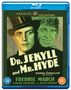 „Dr. Jekyll and Mr. Hyde“ mit Fredric March. Zwei kontrastierende Gesichter, eines im Zylinder, das andere wild., Blu-ray Disc