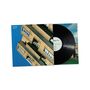 Text: "Dog Unit - Runners". Plattenhülle mit schrägem Gebäude und Vinyl-Schallplatte, Himmel im Hintergrund., LP