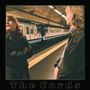 Text "The Cords" unten. Zwei Personen auf einem Bahnsteig, mit U-Bahn im Hintergrund. Retro-Atmosphäre., LP