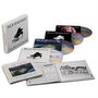 "Rick Wakeman: The Studio Albums Collection" steht auf einer Schachtel, umgeben von CDs und einem aufgeschlagenen Booklet., 3 CDs und 1 DVD