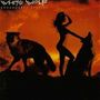 Text: "White Wolf Endangered Species." Silhouette einer Frau und zweier Wölfe vor einem leuchtend orangefarbenen Himmel., CD