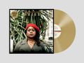 „Limited Edition Gold Vinyl. Zara McFarlane Arise.“ Frau mit rotem Barett vor tropischen Pflanzen, goldene Schallplatte.