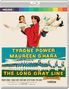 „TYRONE POWER, MAUREEN O'HARA in JOHN FORD'S THE LONG GRAY LINE.“ Ein Mann hebt eine lächelnde Frau hoch.