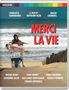 Texte: "MERCI LA VIE", "A FILM BY BERTRAND BLIER". Zwei Frauen im Einkaufswagen am Strand.