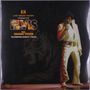 Ein Sänger in einem weißen Anzug hält ein Mikrofon. Links steht "Las Vegas Hilton presents Elvis The Raging Tiger Closing Night 1974"., 2 LPs