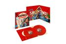 Text: "MADNESS HIT PARADE VOLUME ONE 1979–1986" und "SHOWTIME!". Rotes, fröhliches Vinyl-Set mit Musiker-Illustrationen.