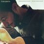 "TOM SMITH" oben links, "THERE IS NOTHING IN THE DARK THAT ISN'T THERE IN THE LIGHT" oben rechts. Mann spielt Gitarre., CD