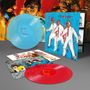"Maxi", "telex" auf blauer und roter Vinylplatte. Künstlerische Illustrationen mit bunten, abstrakten Figuren im Hintergrund.