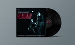 "ROADMAP" in großen rosa Buchstaben. Zwei Männer mit Blasinstrumenten auf einem schwarz-grauen Hintergrund., LP