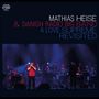 "Mathias Heise & Danish Radio Big Band A Love Supreme Revisited" steht oben, mit Musikern auf einer Bühne im Hintergrund., CD