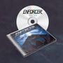 "ENFORCER - ZENITH" steht auf CD und Hülle. Cover zeigt Person mit erhobenen Armen vor kosmischem Hintergrund., CD