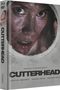 "CUTTERHEAD" in großen Buchstaben. Eine Nahaufnahme eines schmutzigen Gesichts in einem runden Rahmen., 1 Blu-ray Disc und 1 DVD