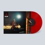 Text zur Band, Albenname und Liedtitel sind sichtbar. Ein rotes Vinyl zeigt ein Cover: Person sitzt vor Feuer, stimmungsvoll., LP