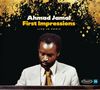 Ahmad Jamal "First Impressions: Live in Paris". Ein Mann im Anzug spielt konzentriert an einem Klavier. Goldene Spritzer oben., CD