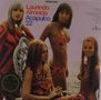 „Lauindo Almeida Acapulco '22“, vier Frauen in bunten Strandoutfits, eine sitzt auf einem dekorativen Stuhl., LP