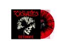 Text: "The Casualties", "Detonate". Eine rote Vinylplatte mit schwarzem, strahlenartigem Muster und ein Totenkopf mit Irokesenschnitt., LP