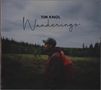 Text: "Tim Knol Wanderings". Eine Person in roter Jacke mit Rucksack steht in einer weiten Landschaft unter bewölktem Himmel., CD