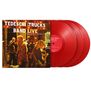 "TEDESCHI TRUCKS BAND LIVE" steht auf einem Albumcover, das Musiker auf einer Bühne zeigt, begleitet von roten Schallplatten., 3 LPs