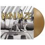 Text: "Bikini Daze," "MØ." Frau liegt auf einem Autodach mit Palmen und Bergen im Hintergrund. Goldene Schallplatte., Single 10"