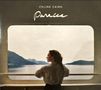 "Celine Cairo, Panacea." Eine Frau betrachtet von einem Balkon aus ruhig eine malerische See- und Berglandschaft., CD
