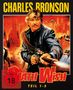"CHARLES BRONSON, DEATH WISH, TEIL 1-5, FSK ab 18." Ein Mann mit Gewehr in einer actiongeladenen Szene vor einer Stadt., 5 DVDs
