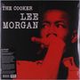 Text: "The Cooker Lee Morgan". Person in Rot-Ton mit nachdenklichem Ausdruck, Hand vor dem Gesicht., LP
