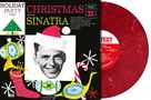 "Christmas with Sinatra" Albumcover, zeigt Frank Sinatras Gesicht mit Weihnachtsmütze, festliche Illustrationen und Schallplatte., LP