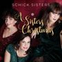 „Schick Sisters“ und „A Sisters Christmas“. Drei Frauen in eleganter Abendgarderobe sitzen zusammen., LP