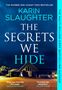 "The Secrets We Hide" von Karin Slaughter, Lob von Freida McFadden und Gillian Flynn, Haus bei Nacht., Buch
